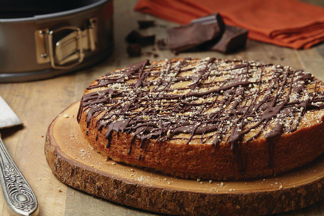 chocolate orange almond torte on wood serving board