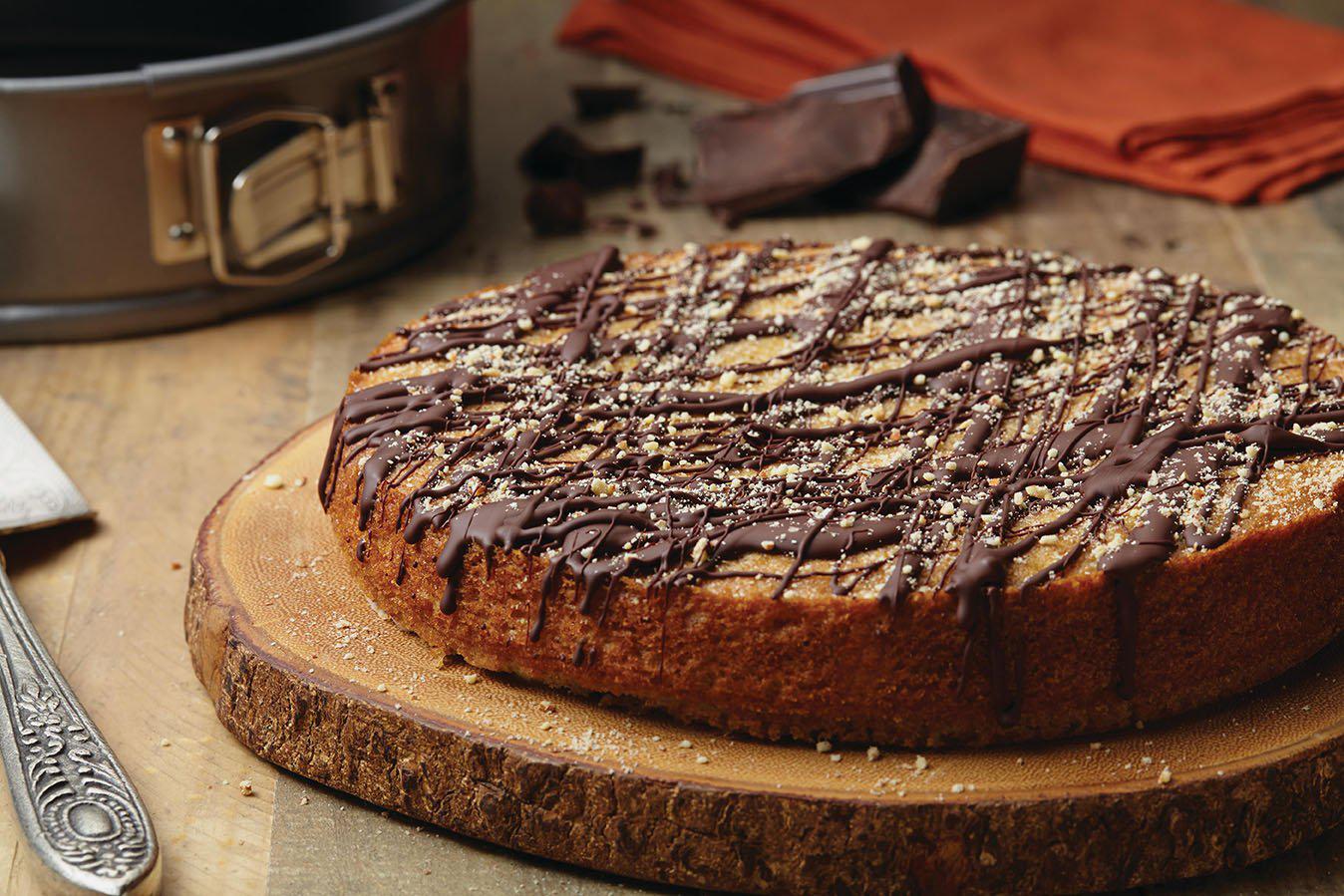 chocolate orange almond torte on wood serving board