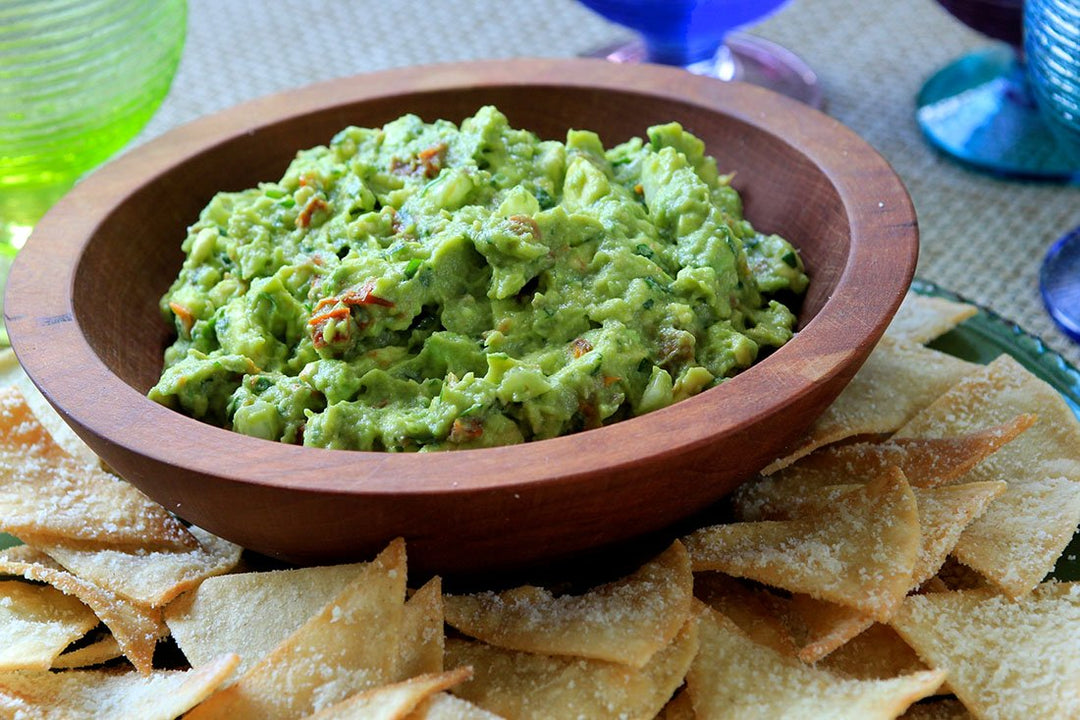 Basil and Sun-Dried Tomato Guacamole with Parmesan Tortilla Chips