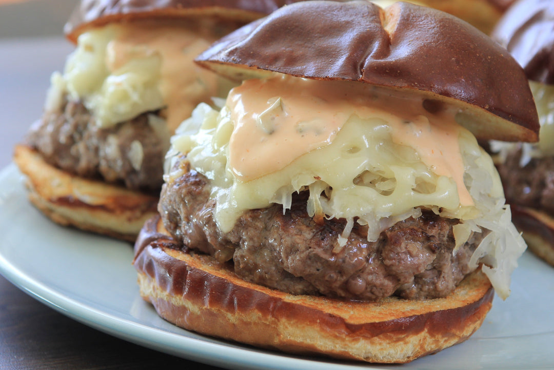 Reuben Burgers on Pretzel Rolls