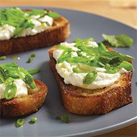 Crostini with Ricotta, Sugar Snap Peas and Mint