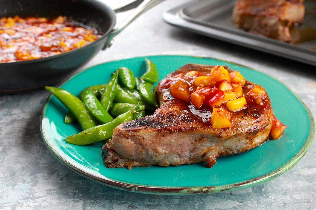 Weekend Double Cut Spice Rubbed Pork Chops with Harissa-Peach Chutney