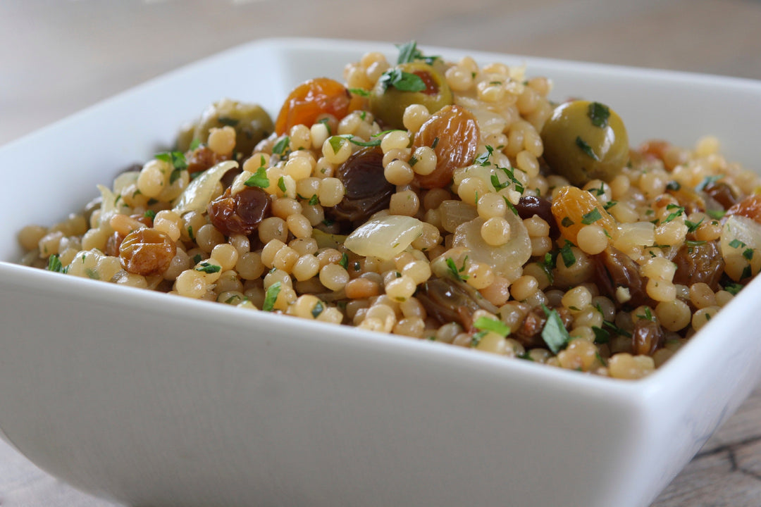 Toasted Israeli Couscous with Olives and Golden Raisins