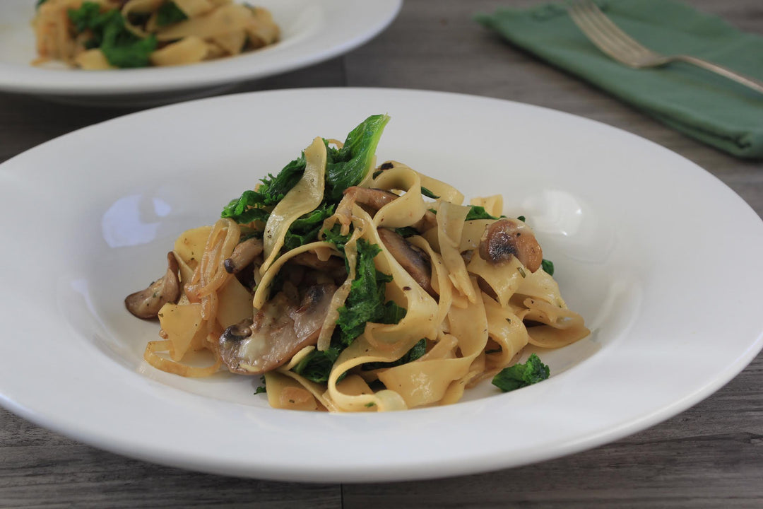 Pappardelle with Caramelized Onions, Mustard Greens and Wild Mushrooms