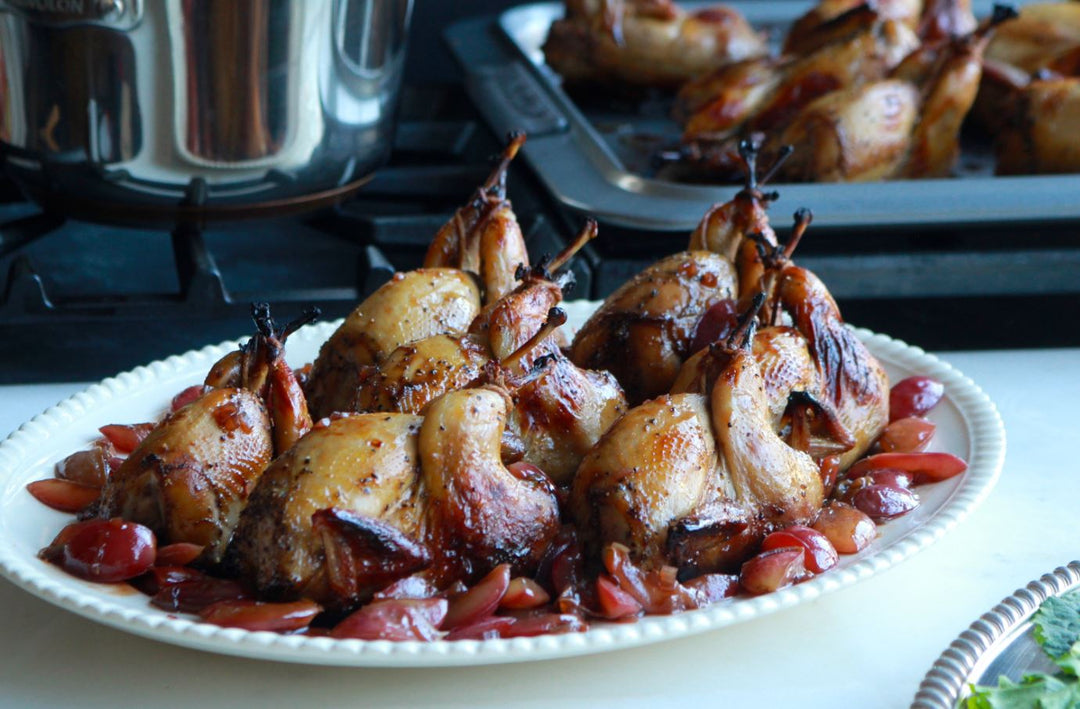 Molasses and Black Pepper Quail with Rum, Honey and Grape Reduction