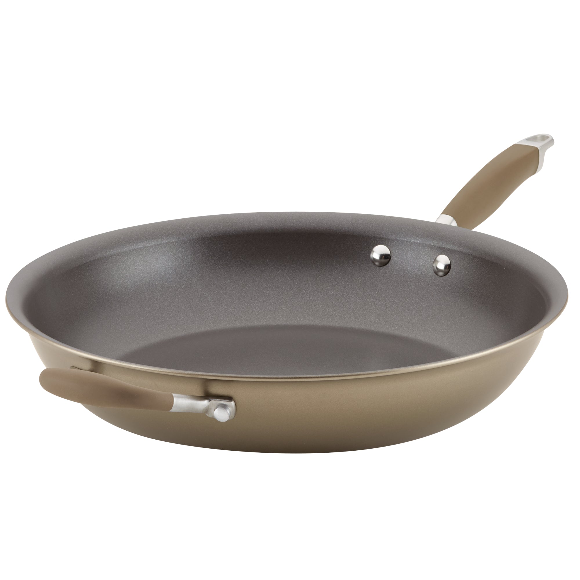 A non-stick frying pan with a brown exterior and a gray interior, featuring a long handle and a smaller helper handle on the opposite side. The pan is tilted at an angle, showcasing its smooth surface.