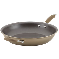 The Advanced Home 14.5-Inch Open Skillet with Helper Handle is crafted from hard-anodized aluminum and showcases a brown exterior with a dark interior. It includes a long, soft-grip handle along with an additional short handle for easy lifting. The skillet is oven safe and positioned against a white background.