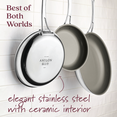 Three stainless steel frying pans with ceramic nonstick interiors hang against a tiled wall. Text reads, Best of Both Worlds and elegant stainless steel cookware with ceramic interior, pointing to one labeled EverLast Ceramic Stainless Steel 3-Piece Ceramic Nonstick Frying Pan Set.