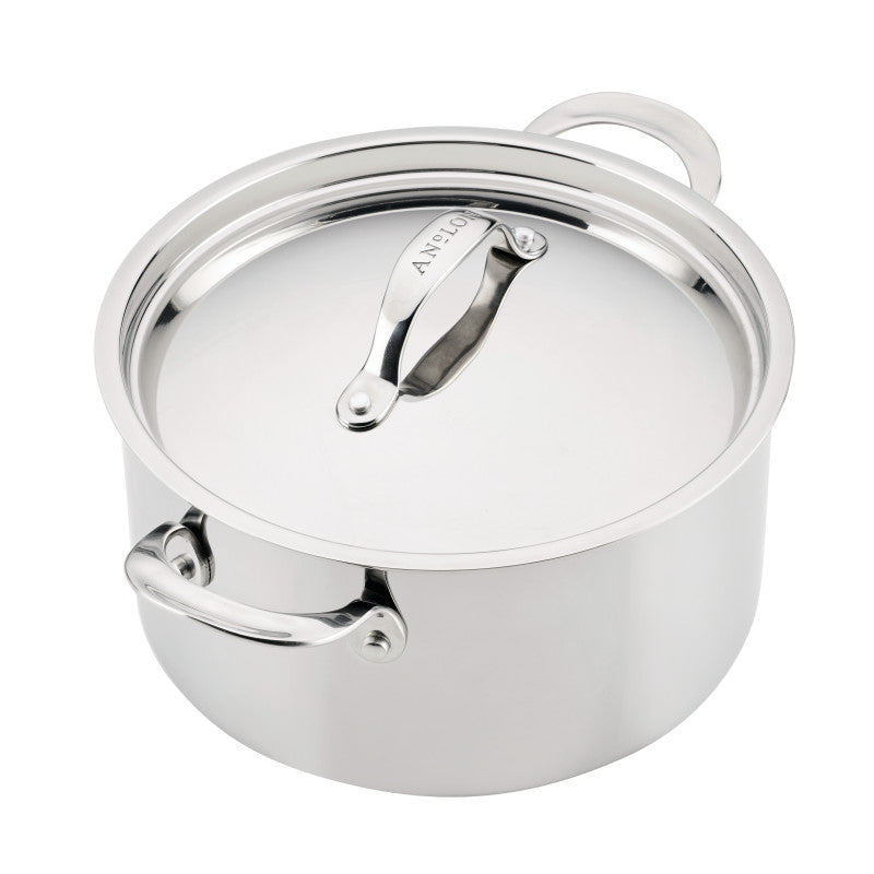 A side-angle, close-up shot of a polished Anolon EverLast Tri-Ply Clad stainless steel stockpot with a matching stainless steel lid and two side handles, displayed against a clean white background.