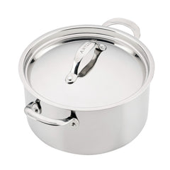 A reflective pot from the EverLast Tri-Ply Clad Stainless Steel 10-Piece Cookware Set, featuring two side handles and a lid with a curved handle.