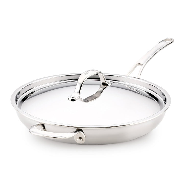 The EverLast Tri-Ply Clad Stainless Steel 12.5-Inch Frying Pan with Lid and Helper Handle, shown on a white background, is ideal cookware for any home chef.