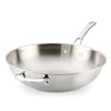The EverLast Tri-Ply Clad Stainless Steel 12.25-Inch Stir Fry with Helper Handle features a smooth, shiny interior and two handles—one long, one short—resting empty on a white background, ideal for any home chef.