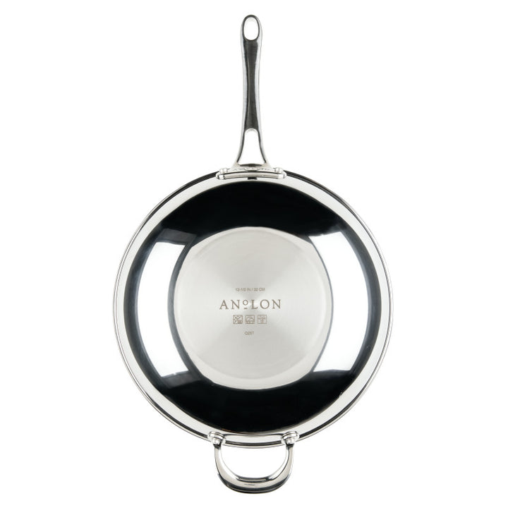 A 12.25-Inch Stir Fry with Helper Handle from EverLast Tri-Ply Clad Stainless Steel, viewed from above with a long top handle and a short bottom loop; the brand engraved in the cookware’s center—ideal for any home chef.