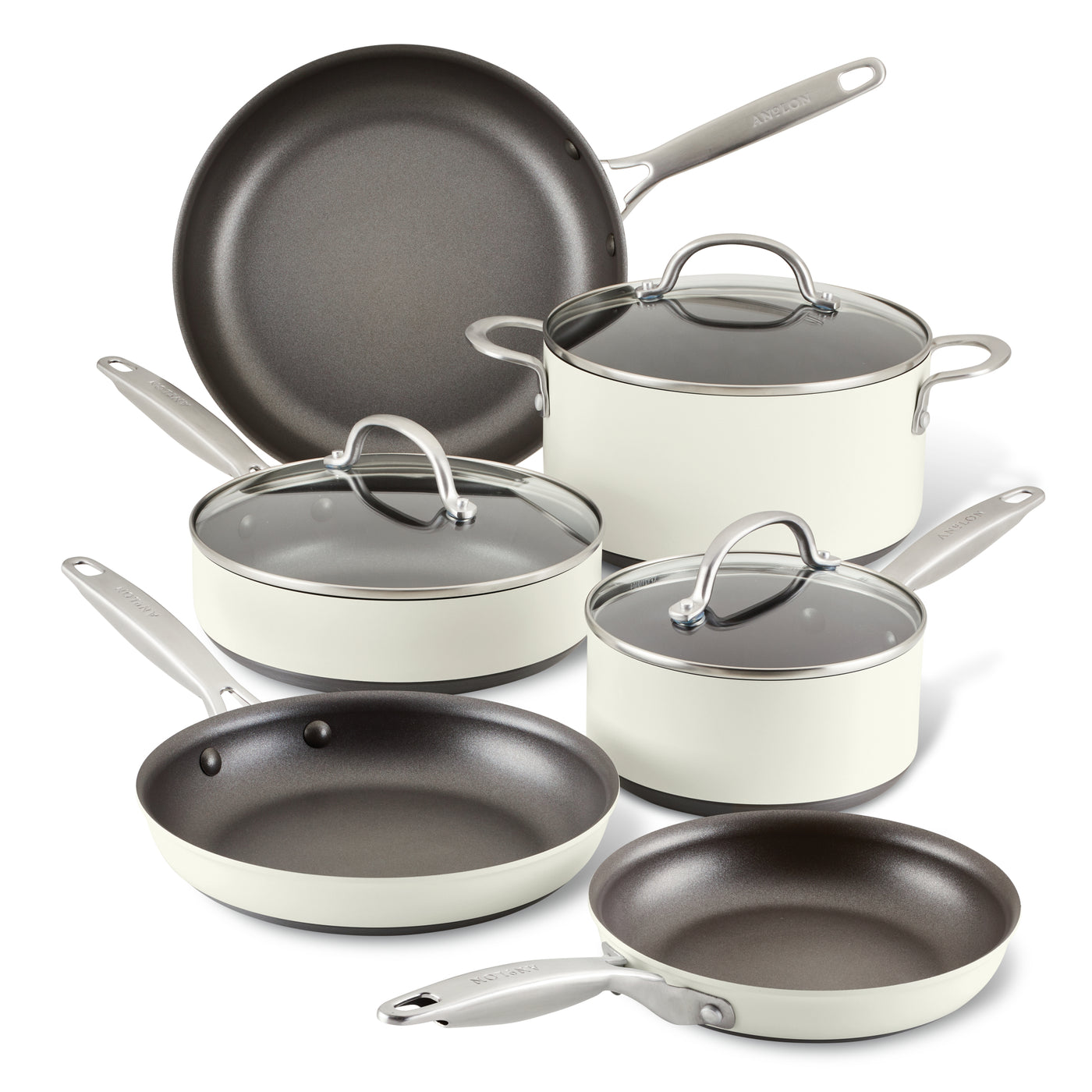 A set of white ceramic cookware with metal handles, including two frying pans, two saucepans with lids, a sauté pan with a lid, and a stockpot with a lid, arranged on a white background.