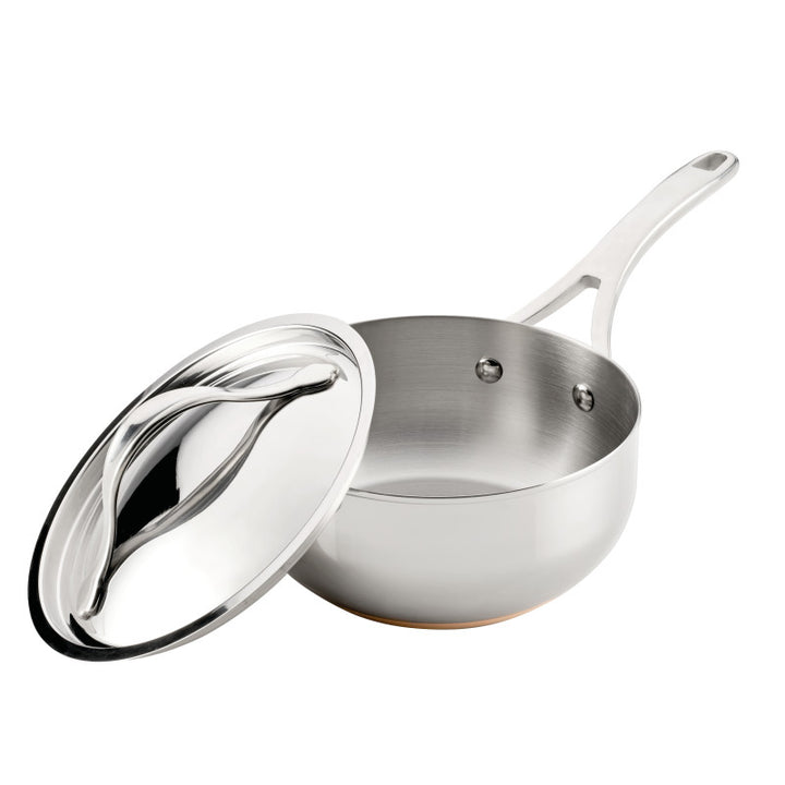 The Nouvelle Stainless 2.5-Quart Saucier with Lid features a long handle and lid resting at an angle on the rim. Its empty, clean interior ensures optimum heat control for precise cooking tasks.