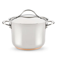 The Nouvelle Stainless 6.5-Quart Stockpot with Lid features two side handles and a copper-colored base—essential cookware for any kitchen, shown isolated on a white background.