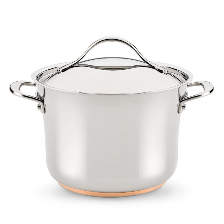The Nouvelle Stainless 6.5-Quart Stockpot with Lid features two side handles and a copper-colored base—essential cookware for any kitchen, shown isolated on a white background.