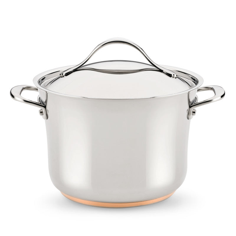 The Nouvelle Stainless 6.5-Quart Stockpot with Lid features two side handles and a copper-colored base—essential cookware for any kitchen, shown isolated on a white background.
