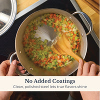 A person stirs chopped carrots, celery, and onions in a Nouvelle Stainless 6.5-Quart Stockpot with Lid using a wooden spoon. Text reads: No Added Coatings. Clean, polished steel lets true flavors shine.