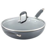 A gray Advanced Home 12-Inch Ultimate Stir Fry Pan with a glass lid and metal and silicone handles on both sides is shown on a white background.