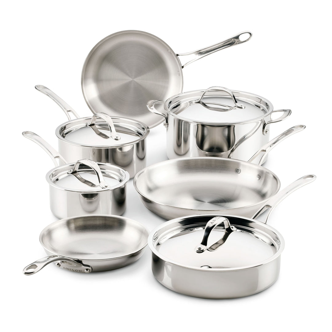 The EverLast Tri-Ply Clad Stainless Steel 11-Piece Cookware Set includes three pots with lids, two frying pans, a sauté pan with lid, and a large covered stockpot—all shown on a white background.