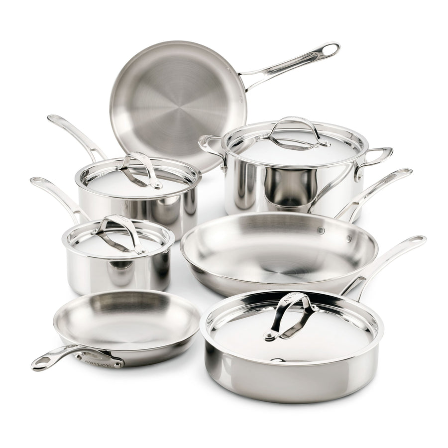 The EverLast Tri-Ply Clad Stainless Steel 11-Piece Cookware Set includes three pots with lids, two frying pans, a sauté pan with lid, and a large covered stockpot—all shown on a white background.