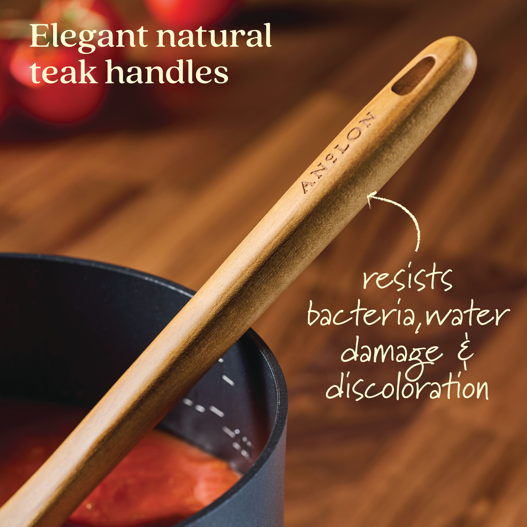 Close-up of a wooden spoon with "Tools and Gadgets" engraved on the handle, stirring tomato sauce in a pot. Text on the image reads: Elegant natural teak handles and resists bacteria, water damage & discoloration, just like our 3-Piece Spatula Set with its durable silicone head.