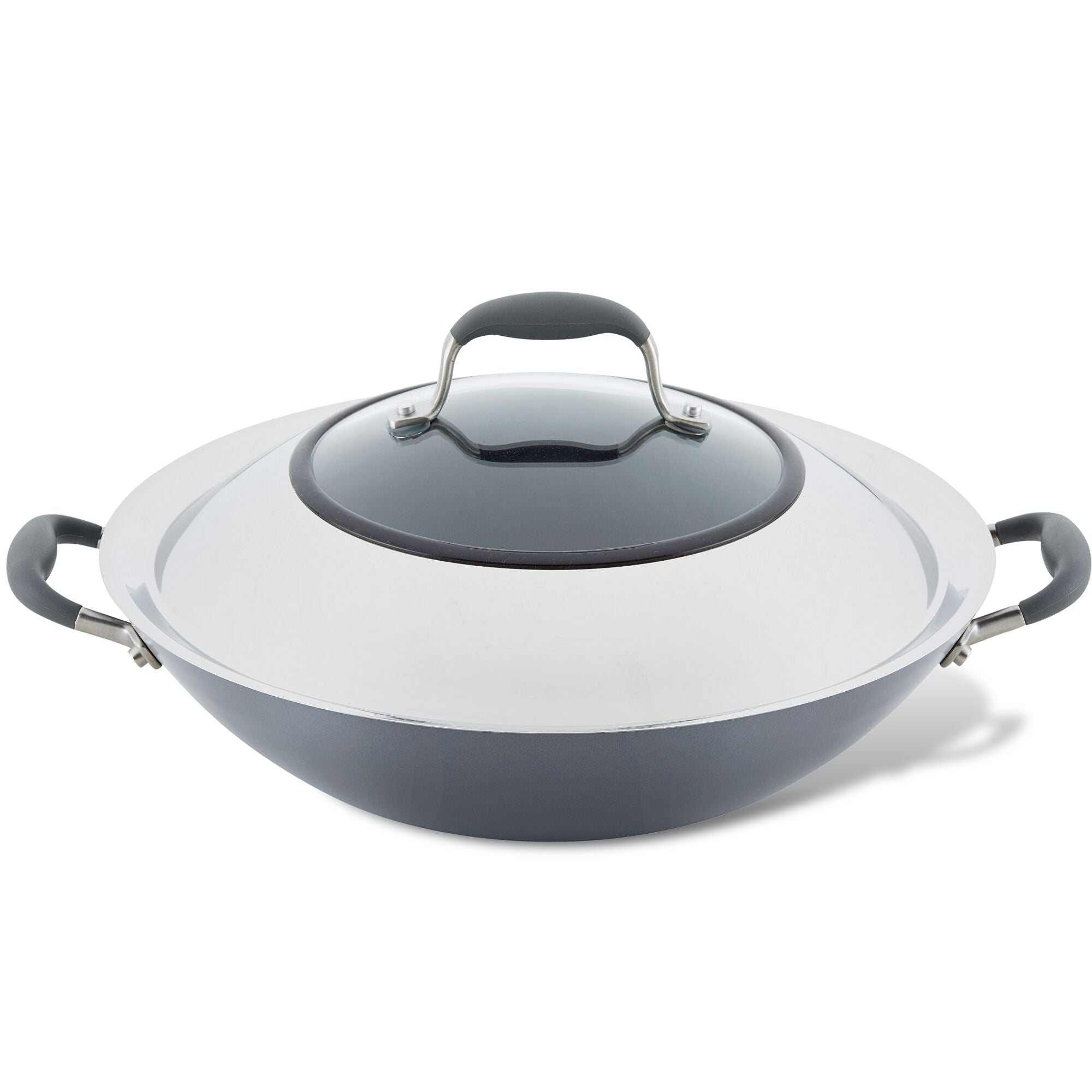 A covered wok with black handles and a lid sits on a white background. The wok has a metallic finish.