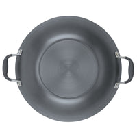 Top view of a large, round, gray Anolon pan with two silver handles. The brand name Anolon is embossed in the center of the pans base.