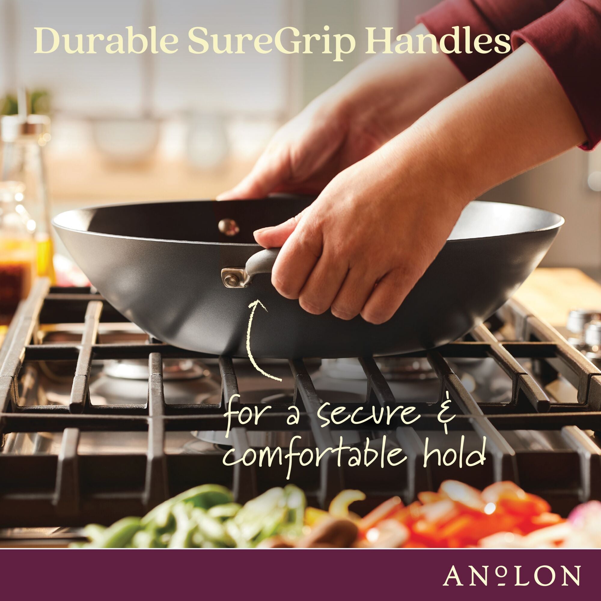 A person holds a frying pan with a handle over a stove. Text reads, Durable SureGrip Handles for a secure & comfortable hold. The background shows ingredients in bowls and jars.