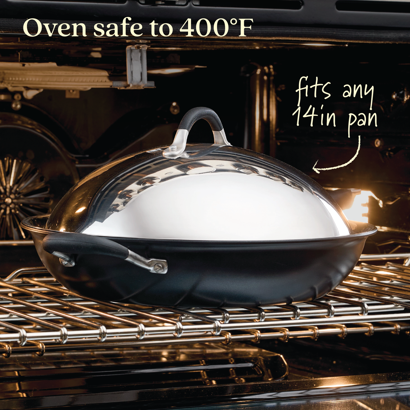 A 14-Inch Stainless Steel Domed Lid by Advanced Home, designed to fit any 14-inch pan, sits on an oven rack. Text above states "Cookware safe to 400°F", while the oven light illuminates the shiny, durable metal lid.