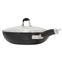 A black, nonstick frying pan with a glass lid and a black handle. The pan has a deep design and a stainless steel rim around the lid. The handle has a rubber grip for comfortable holding.