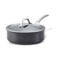 The Anolon X 3.5-Quart Hybrid Nonstick Induction Sauté Pan features a glass lid and long metal handle, offers versatile cooking with SearTech technology, and is oven safe to 500°F—all on a crisp white background.