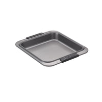 A square gray baking pan with black silicone handles on two sides, placed on a white background. The pan has a shallow depth and a smooth surface, suitable for baking.