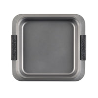 A square gray baking pan with high edges and two black handles on opposite sides, featuring the brand name Anolon embossed on them. The pan has a non-stick surface and a sleek, modern design.