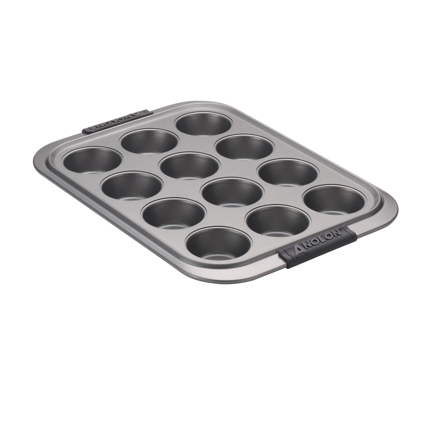 A non-stick, 12-cup muffin pan with a gray metallic finish and black handles on both ends, shown on a white background.