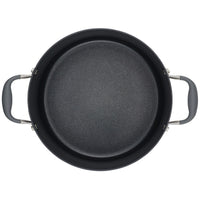 A top-down view of a large, black non-stick cooking pot with two sturdy gray handles on either side. The interior appears smooth and even, suitable for various cooking methods.