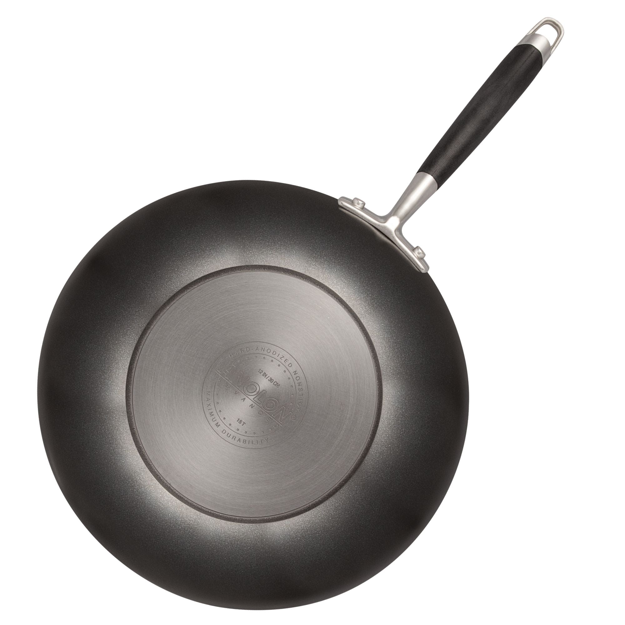 A top view of a black non-stick frying pan with a silver base and a black handle. The pan is placed against a white background.