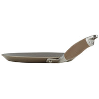 A non-stick frying pan with a wide base and a slightly raised edge. It features a sturdy, ergonomic handle with a metal accent, angled for easy grip and control. The pan is photographed against a plain white background.
