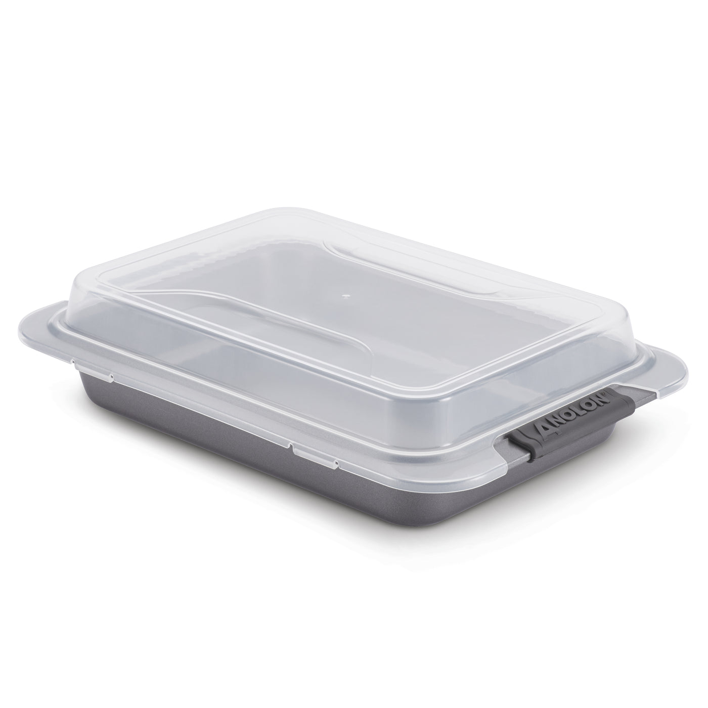 A rectangular gray baking pan with a detachable transparent plastic lid. The lid is securely fastened, and the brand name Anolon is featured on the handle. The pan is designed for baking and transporting food.
