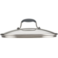 A stainless steel and glass lid with a rounded handle, designed for a cookware pot or pan. The glass is clear, allowing visibility into the pot, and the handle is ergonomic for easy gripping.