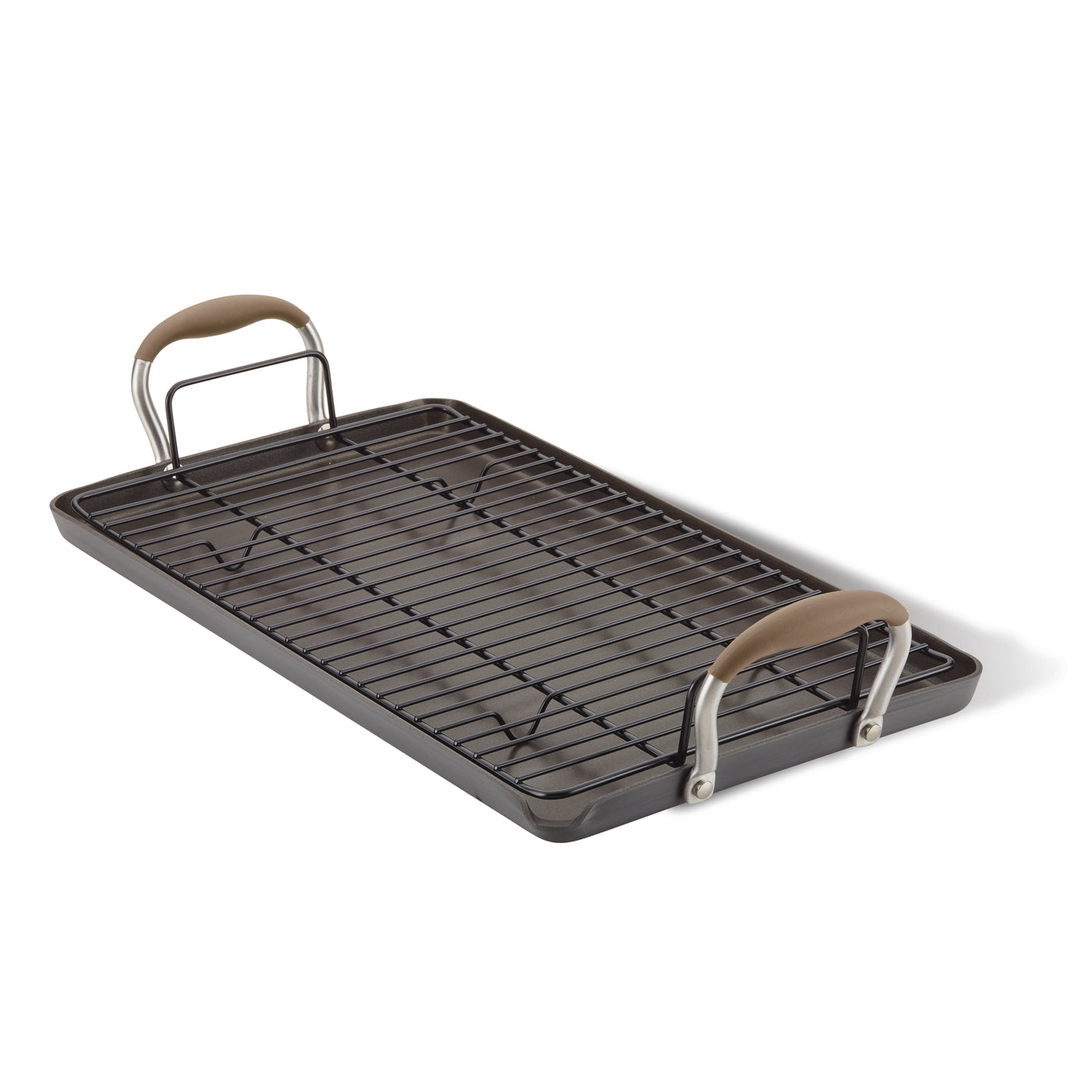 A rectangular non-stick roasting pan with a removable wire rack and two handles. The handles are coated with a brown material for grip. The pan is placed on a white background.
