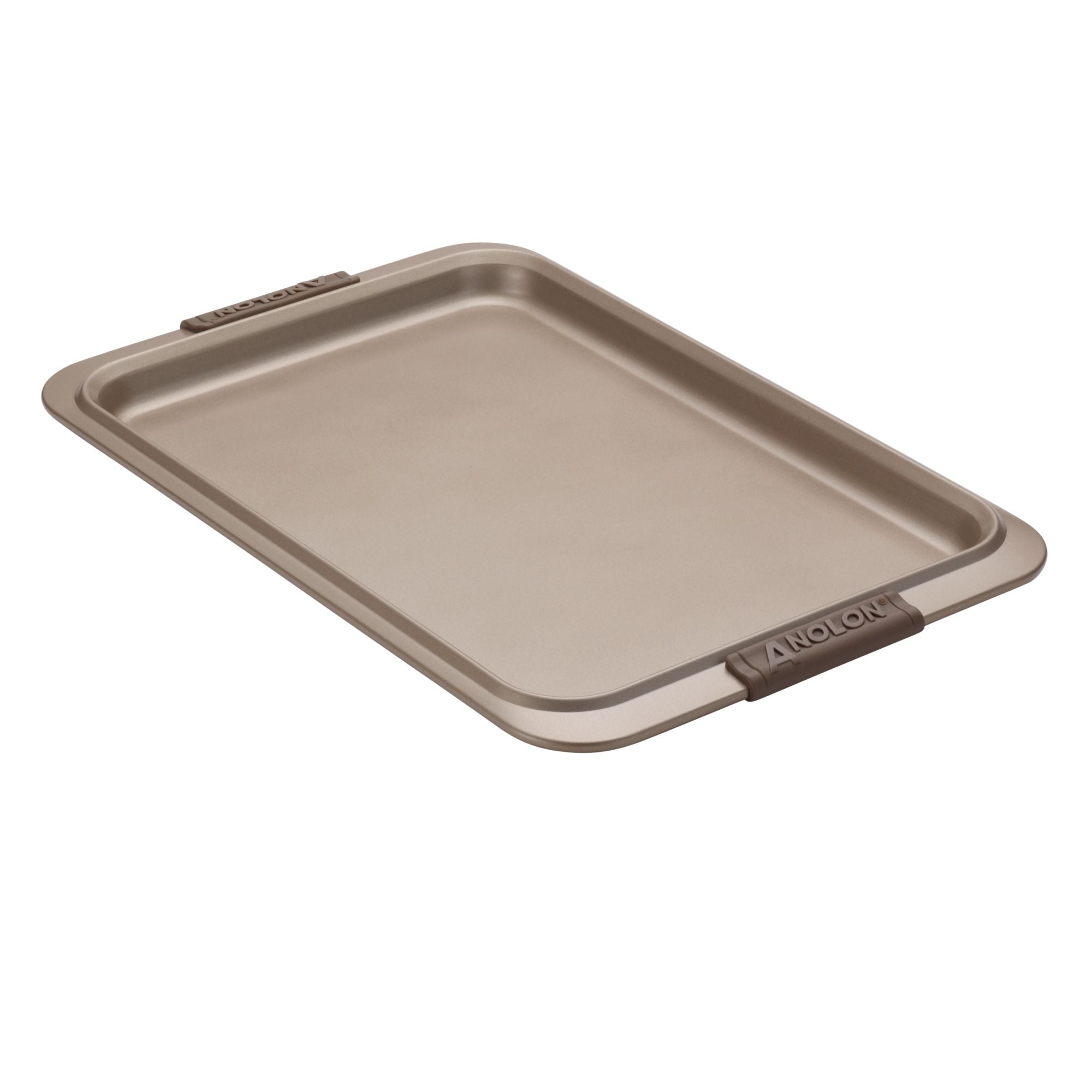 A close-up of a rectangular non-stick baking sheet with raised edges and handles. The surface is smooth and metallic, designed for baking or roasting. The handles feature text for branding.
