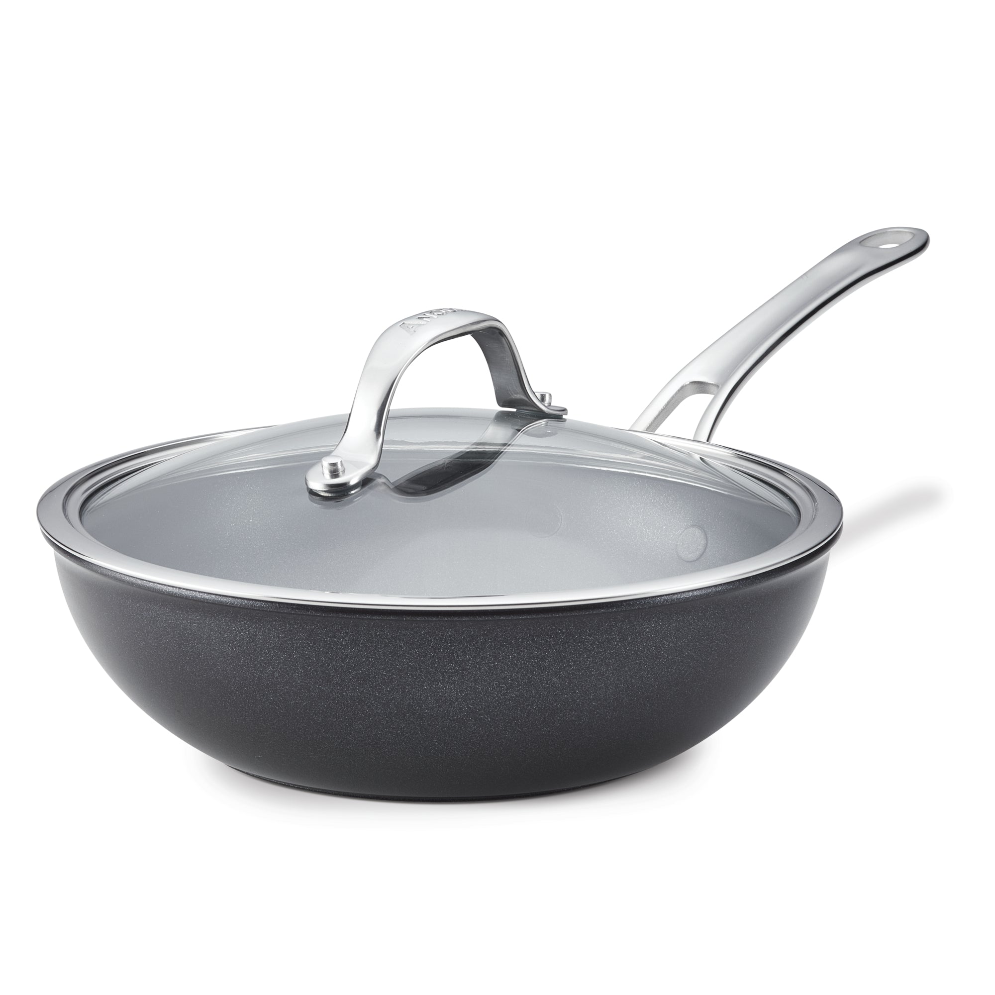 The Anolon X 10-Inch Hybrid Nonstick Wok features a shiny metal handle, a clear glass lid, and a stainless steel base. It has a dark exterior with a sleek, modern design, set against a plain white background, perfect for any culinary adventure.