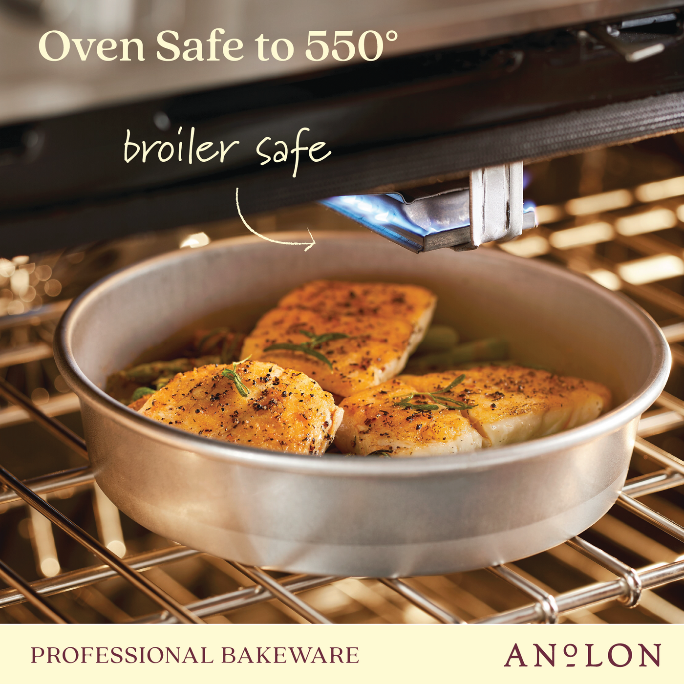 Round 9-inch Pro-Bake aluminized steel cake pan with seasoned, golden-brown chicken pieces in an oven. Text highlights that it is oven safe up to 550° and broiler safe. This pan is ideal for baking layers or roasting, offering versatility and performance.
