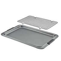 The Advanced 11 x 17-Inch Baking Sheet and Cooling Rack Set features black silicone handles—making it a versatile addition to your bakeware collection.