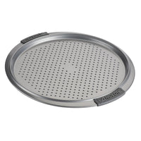 The 13-Inch Pizza Crisper by Advanced is a round, silver pan with a perforated surface, perfect for making crispy pizzas. It features two gray handles branded with the Anolon name. Its nonstick coating allows for easy cleanup and it is oven-safe, ensuring perfect pizzas every time.