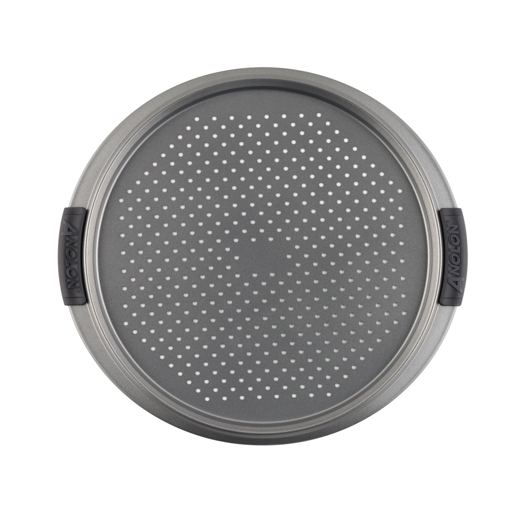 The 13-Inch Pizza Crisper by Advanced features a round, perforated metal design for even baking. It includes a nonstick surface and two black rubber handles on opposite sides for easy handling. This crisper is oven safe, making it an ideal choice for perfectly baked pizzas.