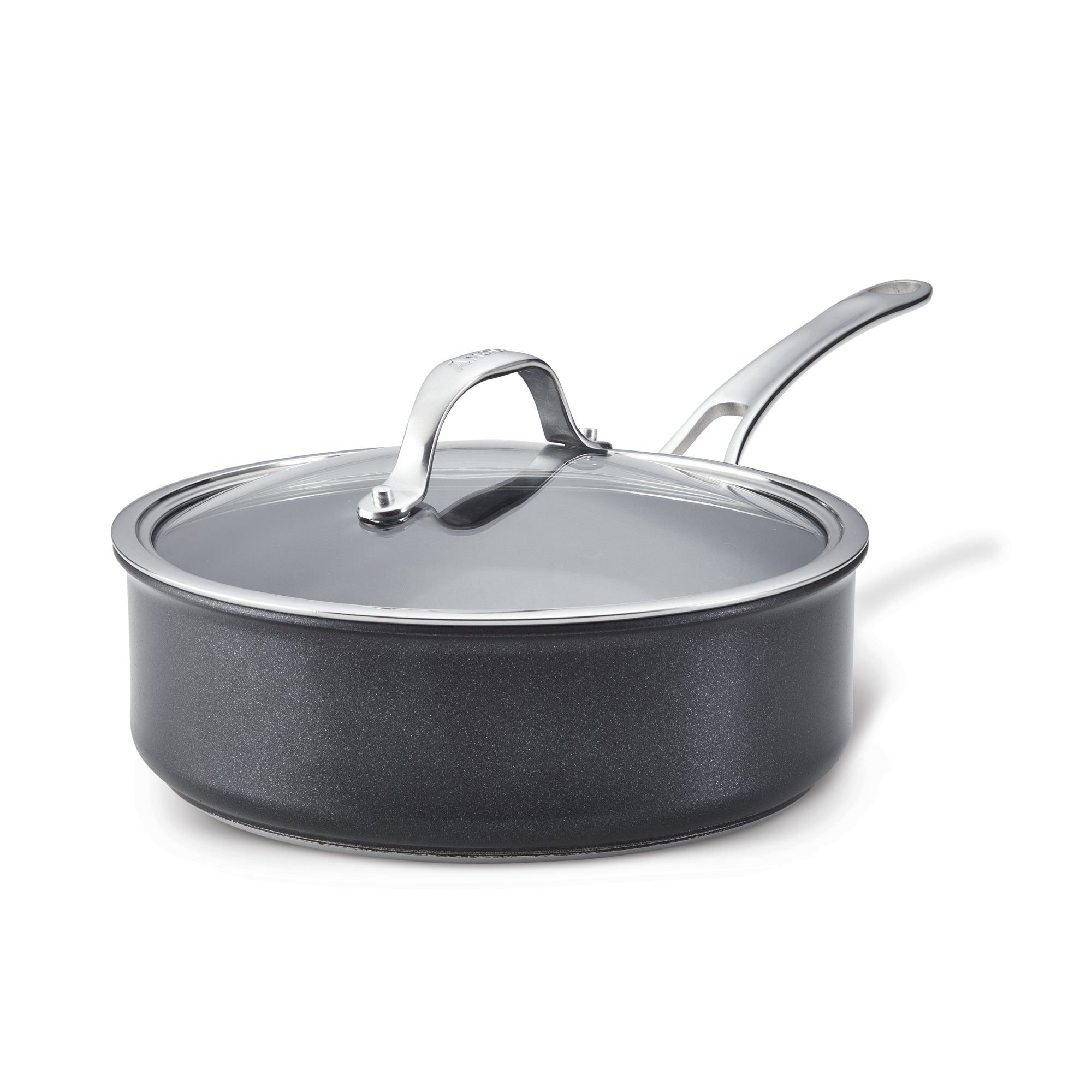 The 3.5-Quart Hybrid Nonstick Induction Sauté Pan with Lid by Anolon X, featuring SearTech technology, includes a shiny metal handle and transparent lid. Oven safe to 500°F and induction-ready, it blends style with advanced functionality for all kitchen needs against a plain white background.