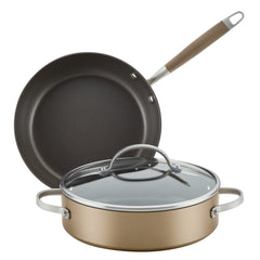 The 3-Piece Frying Pan and Saute Set by Advanced Home includes a non-stick frying pan with a beige handle, alongside a hard-anodized sauté pan with stainless steel handles and a tempered glass lid.